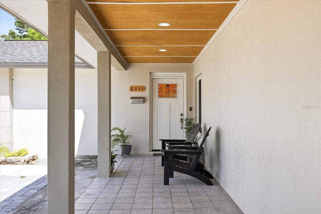 Photo of 8331 W Pocahontas Avenue, Tampa, FL 33615 (MLS # TB8562571)