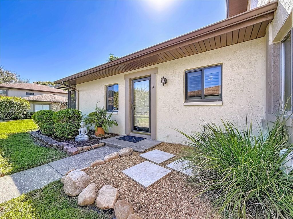 Photo of 2933 Lichen Lane #A, Clearwater, FL 33760 (MLS # TB8438337)