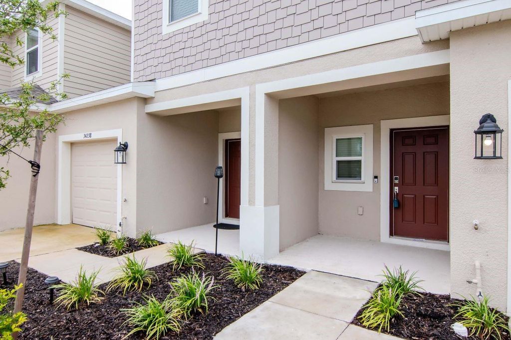 Photo of 34234 Polacca Lane, Wesley Chapel, FL 33543 (MLS # TB8394174)