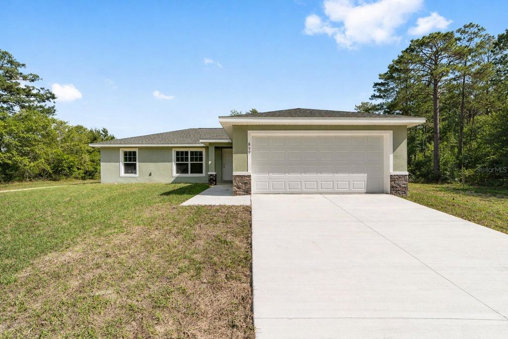 Photo of 8767 N Quarry Drive, Dunnellon, FL 34434 (MLS # OM712056)