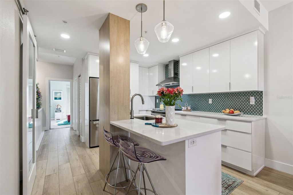 Photo of 320 Island Way #101, Clearwater Beach, FL 33767 (MLS # TB8456859)