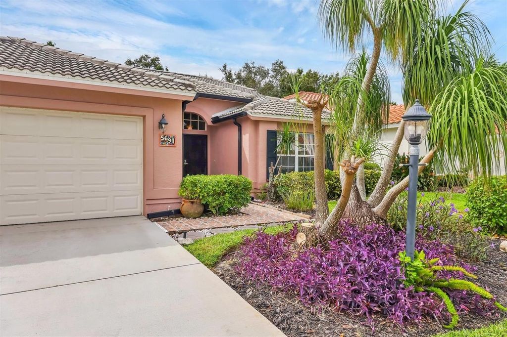 Photo of 5691 Beaurivage Avenue, Sarasota, FL 34243 (MLS # TB8424381)