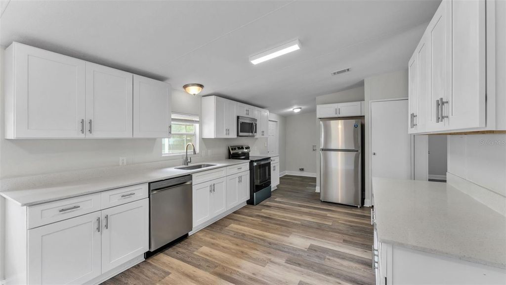 Photo of 4910 Rollinglen Loop E, Lakeland, FL 33810 (MLS # L4960742)