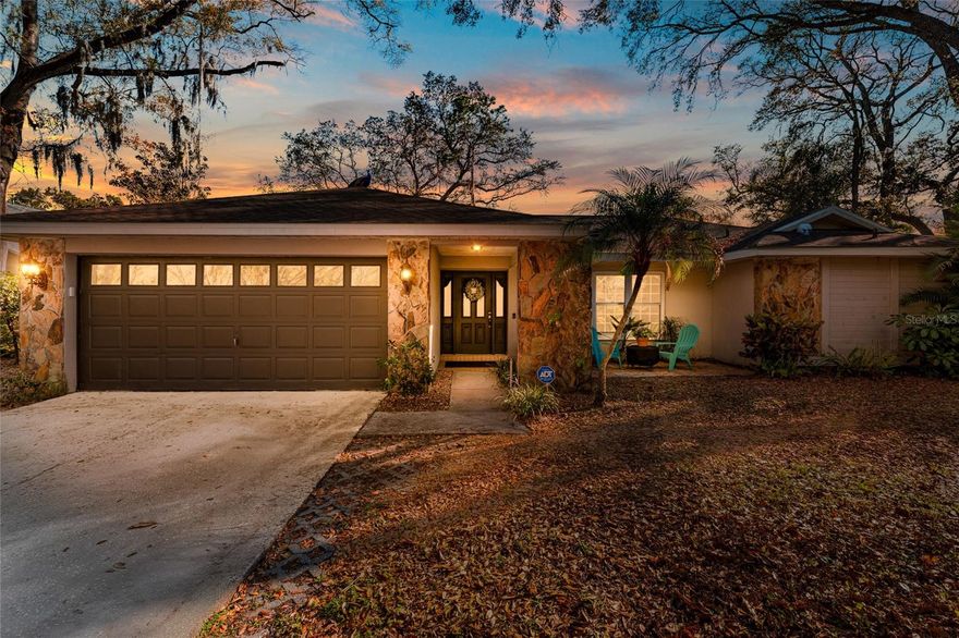 Discover a rare opportunity to own a piece of the sought-after Spanish Manor subdivision, a premier Dunedin, Florida, enclave known for its mature landscaping and oversized lots. This meticulously maintained estate offers the ultimate combination of privacy, durability, and modern functionality on an expansive, quarter-acre wooded lot. Providing a shaded sanctuary that is increasingly difficult to find in the Pinellas County market, this residence boasts striking curb appeal that perfectly matches its lovely interior. Constructed with enduring concrete block and accented by elegant stone masonry, this home offers peace of mind with a new roof replaced in 2024. The property features 2,084 square feet of refined living space (2,846 square feet under roof) and a spacious 2-car attached garage. The interior is defined by a functional and flexible floor plan designed for modern living, where open, adaptable spaces transition effortlessly from quiet relaxation to grand-scale entertaining.Upon entering, you are greeted by a formal dining room and dinette that lead into a "soaring" open-concept living area. The heart of the home is a chef’s kitchen equipped with timeless hardwood cabinetry, sleek Corian countertops, and a central breakfast bar island. The interior finishes include a sophisticated mix of warm wood flooring in the main living areas, durable ceramic tile in high-traffic wet areas, and plush carpet in the bedrooms for ultimate comfort. Both bathrooms have been updated with matching hardwood cabinets topped with elegant granite counters.The thoughtful split floor plan ensures maximum comfort for all, with a primary suite featuring direct access to a covered porch. For seamless Florida living, the secondary bathroom doubles as a pool bath, offering direct access to the screen-enclosed pool area to keep the main living spaces pristine. Large pocket sliders disappear to merge the interior with the pool lanai, creating a harmonious indoor-outdoor flow perfect for enjoying the Florida sun.Located in the heart of Dunedin, one of the most charming waterfront towns on the Gulf Coast, this home is minutes away from an unparalleled lifestyle. Residents enjoy quick access to the pristine sands of Honeymoon Island and Caladesi Island State Park, as well as the 38-mile Pinellas Trail. The vibrant, walkable Downtown Dunedin district offers a unique blend of open-air breweries, boutique shopping, and award-winning dining. As part of the thriving Tampa Bay region—a top national destination in 2026—this location offers proximity to a robust economy, professional sports including Toronto Blue Jays spring training, and a world-class arts scene. This Spanish Manor property is a standout choice for those seeking a durable, move-in-ready home in a prime Tampa-St. Petersburg area location.