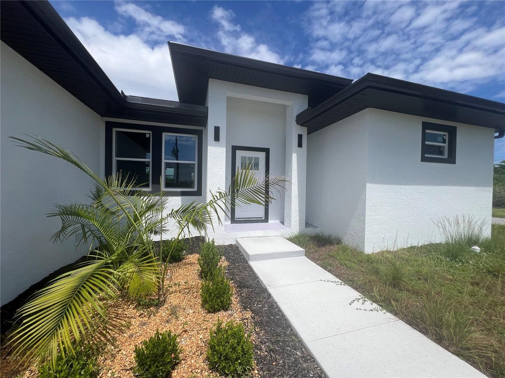 Photo of 15062 Wichita Road, Port Charlotte, FL 33981 (MLS # C7531526)