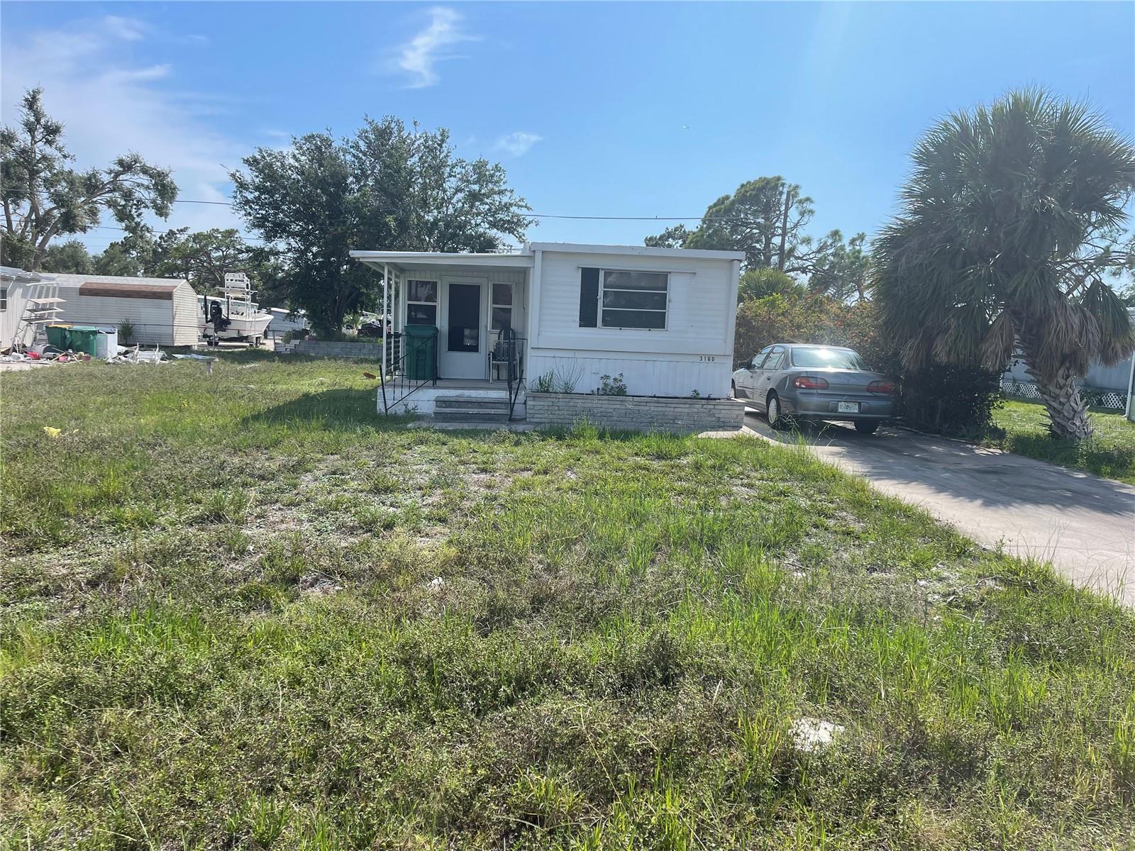 Under contract-accepting backup offers. Highly sought after and flexible area of Englewood. This versatile land can be used to build a new single family home OR can accommodate a new mobile home. Not very many areas like this one that can give you the wide array of options that this home can.
Home was severely damaged during Ian and will need to be removed. Property is being sold as land value only.