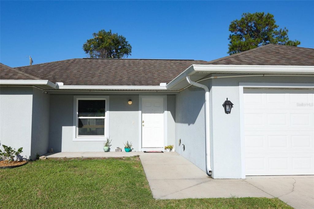 Photo of 1068 Mayflower Avenue, Deltona, FL 32725 (MLS # O6353554)
