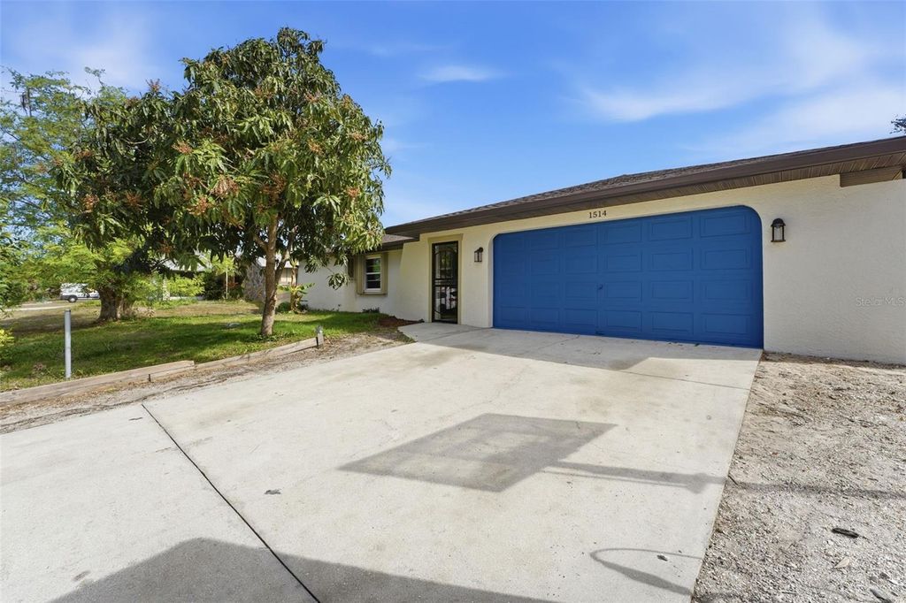 Photo of 1514 Kensington Street, Port Charlotte, FL 33952 (MLS # A4676711)