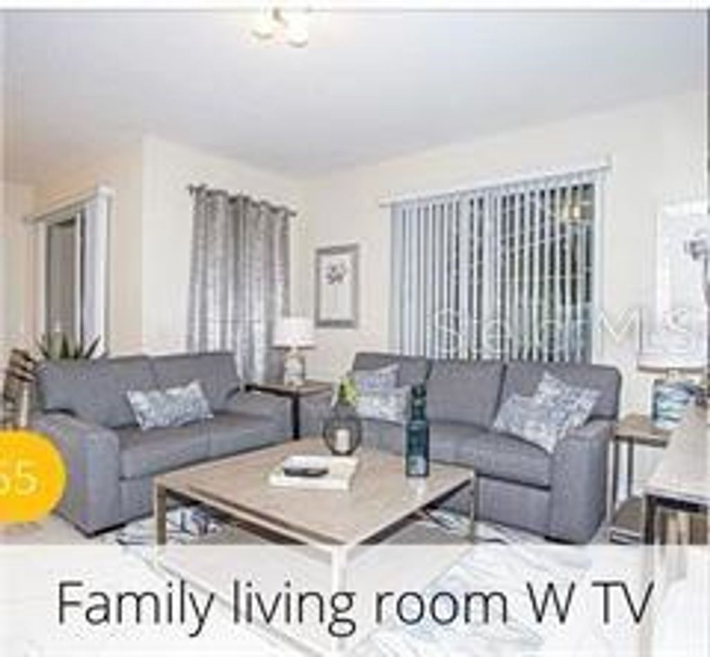 Photo of 218 Ocean Course Avenue, Davenport, FL 33896 (MLS # O6349021)