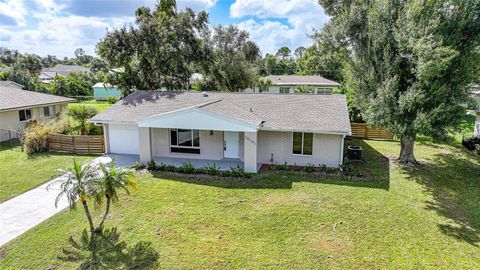 Photo of 20191 Gladstone Avenue, Port Charlotte, FL 33952 (MLS # C7516067)