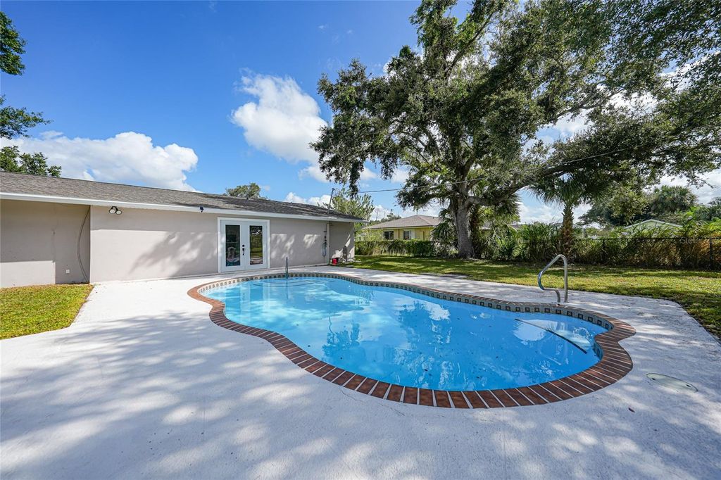 Photo of 20191 Gladstone Avenue, Port Charlotte, FL 33952 (MLS # C7516067)