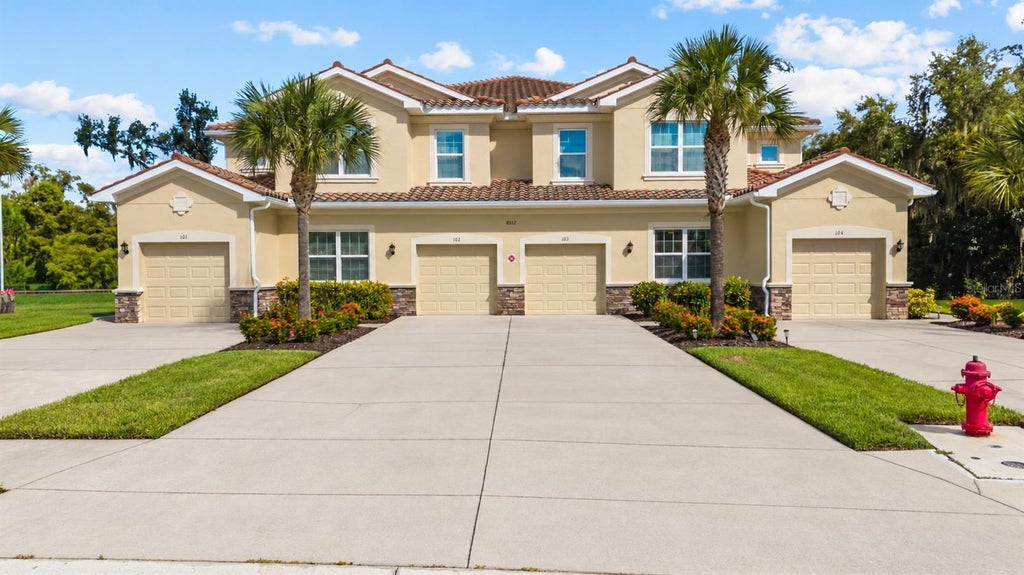 Photo of 8312 Enclave Way #103, Sarasota, FL 34243 (MLS # A4705200)