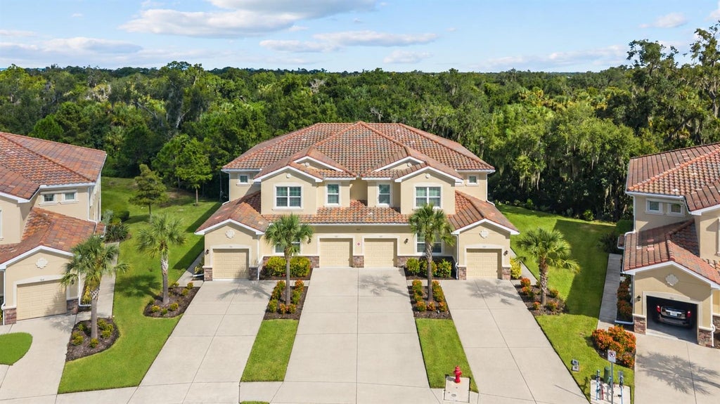 Photo of 8312 Enclave Way #103, Sarasota, FL 34243 (MLS # A4705200)