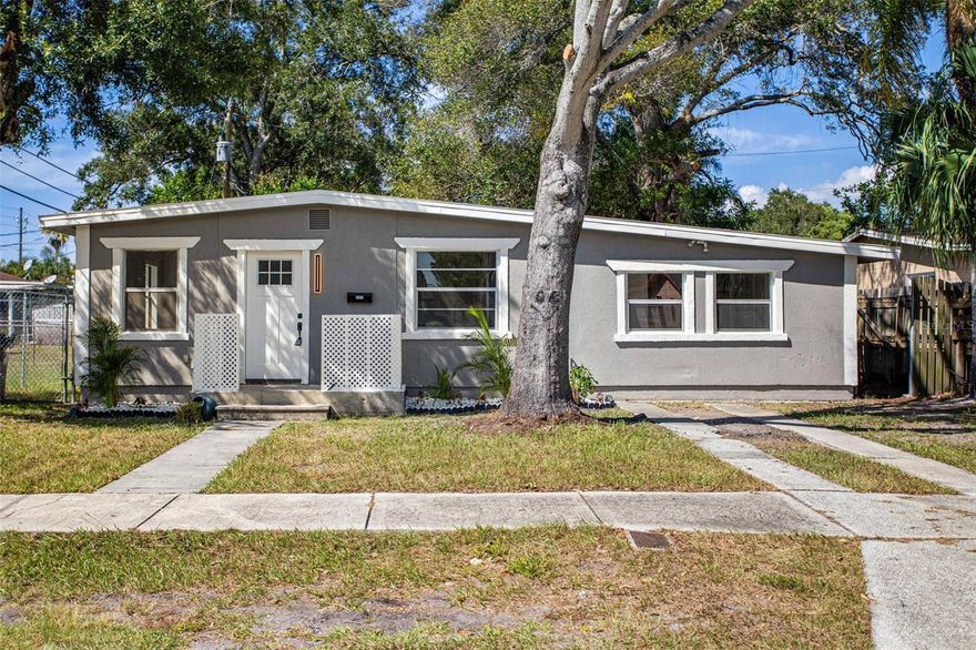 Welcome to your dream home in the heart of sunny St. Petersburg, Florida, just a stone's throw away from picturesque Gulfport Marina and Casino. This prestigiously remodeled property offers a serene and stylish haven for those seeking comfort, convenience, and a taste of coastal living. With its neutral color palette and spacious floorplan, this 3-bedroom, 2-bathroom residence is an oasis just awaiting your personal touch. Nestled on a quiet street, this delightful home boasts 1,188 square feet of living space, perfect for all of your needs. The home has undergone an extensive transformation, both inside and out, making it a true gem in the neighborhood. Freshly painted walls, upgraded fixtures, and modern finishes throughout create a welcoming and move-in-ready atmosphere. The interior is adorned with a tasteful, neutral color scheme and top of the line upgrades, providing a versatile backdrop for your design preferences. The heart of this home is its gourmet kitchen boasting new appliances and ample cabinetry for storage. The eat-at quartz bar adds a contemporary touch, creating a perfect spot for casual dining or entertaining guests. With three well-appointed bedrooms and two modern bathrooms with ornate black stone mosaic shower bottoms, there's ample space for family, guests, or a home office. Enjoy the ultimate privacy with the split bedroom layout. The primary bedroom is situated on one side of the house, while the two additional bedrooms are on the opposite side, providing separation and tranquility. The primary bedroom is a spacious retreat featuring an ensuite bathroom for your convenience plus plenty of closet space. Sliding glass doors open to the backyard, allowing you to savor the Florida sunshine and evening breezes right from your room. Beautiful laminate flooring flows throughout the home creating an easy-to-maintain and clean finish. Nestled in a prime St. Petersburg location, this property is within a short drive of the Gulfport Marina, offering endless opportunities for boating, fishing, and waterfront dining. The area is known for its vibrant arts scene, eclectic shops, and delicious restaurants. You'll also have easy access to the beautiful Gulf Coast beaches, downtown St. Petersburg, and all the amenities this sunny region has to offer. Don't miss this fantastic opportunity to own a newly remodeled, move-in-ready home in the desirable St. Petersburg area. Schedule a showing today and start living the Florida lifestyle you've always dreamed of!