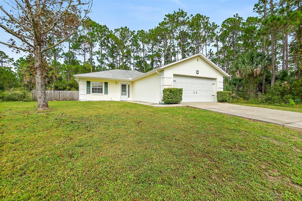 Photo of 16 Slumber Meadow Trail, Palm Coast, FL 32164 (MLS # FC322435)
