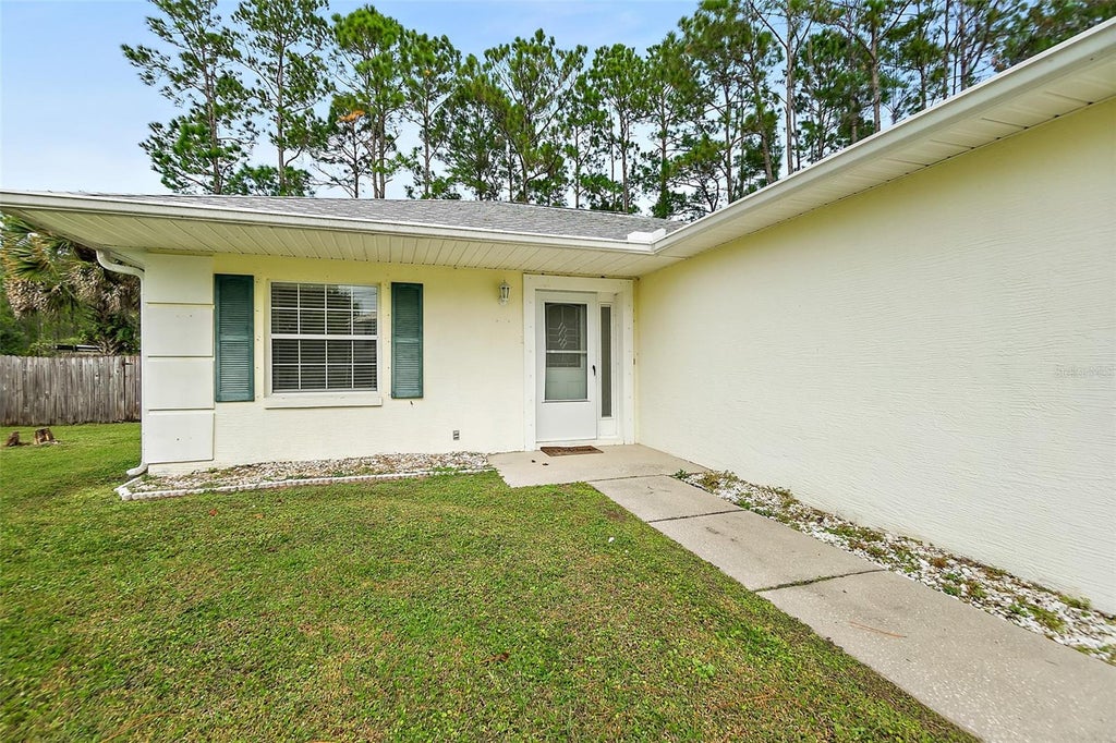 Photo of 16 Slumber Meadow Trail, Palm Coast, FL 32164 (MLS # FC322435)