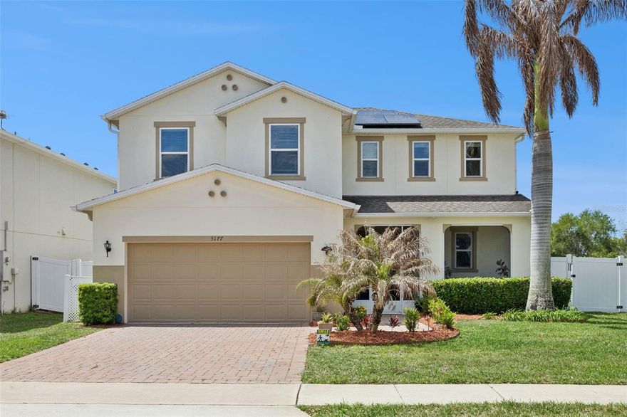 Experience refined Florida living in this beautifully appointed residence in Tavares, known as America’s Seaplane City. Positioned on a premium corner lot within a well-maintained community, this home offers enhanced privacy, expanded outdoor space, and impressive curb appeal. Perfectly situated just steps from the community pool, the property offers effortless access to resort-style amenities.
A desirable first-floor primary suite provides comfort and convenience, ideal for both privacy and ease of living.  Also upstairs, one of the secondary bedrooms features its own private bathroom, offering added flexibility for guests or multigenerational living.
Ideally located near the shores of Lake Eustis, residents can enjoy boating, and scenic outdoor experiences. The home is also a short drive from Mount Dora, known for its charming historic district, boutique shopping, and year-round festivals. Easy access to Orlando and major roadways ensures seamless connectivity.
Thoughtfully upgraded, the home features paid-off solar panels for energy efficiency, a recently replaced HVAC system (2024), and tile and vinyl flooring throughout and central vacuum system for added convenience.The extended screened lanai with paver enhancements creates a private outdoor retreat, perfect for entertaining or relaxing. 
Whether as a primary residence, seasonal escape, or investment opportunity, this exceptional property offers comfort, style, and the best of Central Florida living.