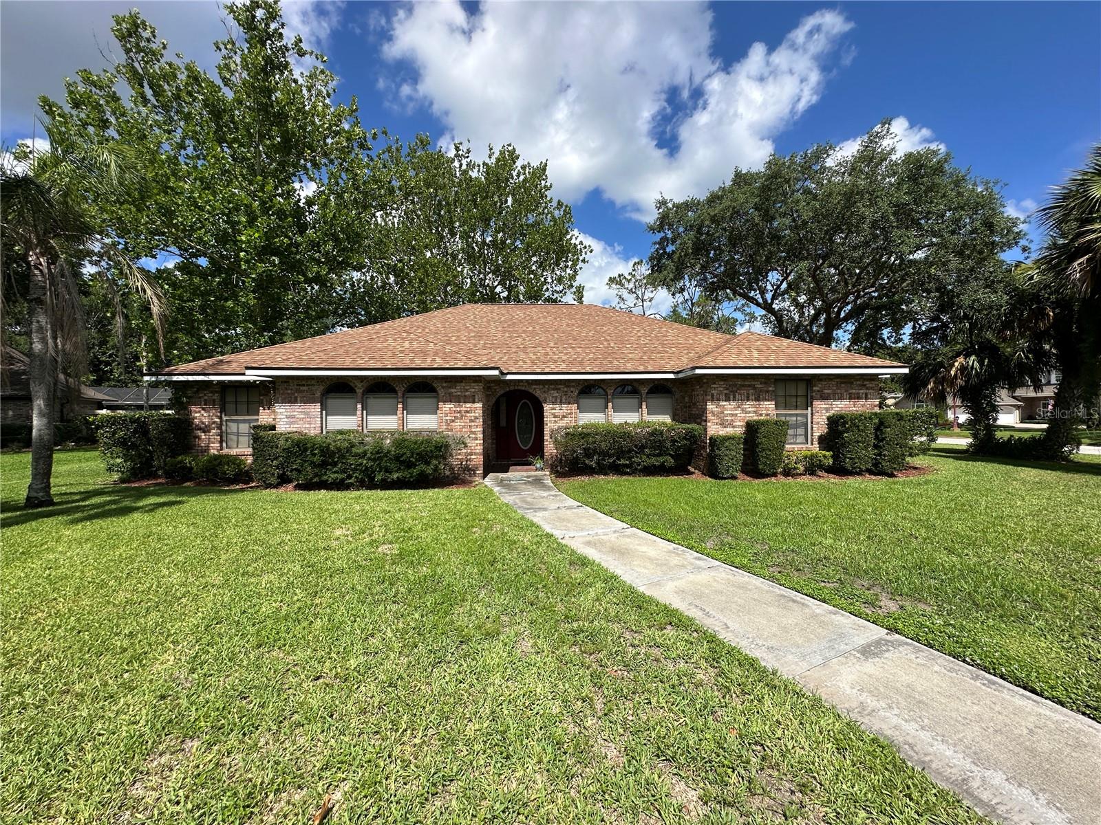 Dream Home in the Making! This spacious 5-bedroom, 4-bathroom home in desirable Volusia County offers over 3,000 sqft of living space, perfect for large families or multi-generational living. Built in 1990 and featuring a 2-car garage, this property sits on a generous lot with a big yard—ideal for entertaining, gardening, or future additions. Connected to sewer and ready for your personal touch, this home is being offered as a cash-only deal, presenting a fantastic opportunity for investors or buyers looking to customize a large home in a great location. Don’t miss out on the potential this property has!