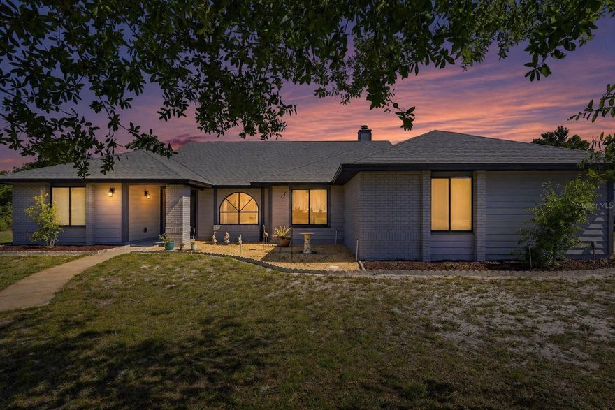 This is your chance to own your own private retreat in the highly sought after Orlandia Heights community! Situated on a 1-acre lot in the heart of DeBary, this move-in ready property offers the perfect blend of space, privacy, and convenience. Just minutes from shopping, a short drive to Highbanks Marina, and close to Rob Sullivan Park.

This 4-bedroom, 2.5-bath home features a desirable split floorplan, offering both functionality and flexibility. Recent updates include fresh exterior  paint (2025), updated flooring, beautifully updated bathrooms (2025), and new stainless steel appliances givies the home a clean, modern, move-in ready feel.

Major system updates provide added peace of mind, including a new roof (2023), A/C (2022), ductwork (2017), and septic pumped in 2022.

A standout feature of the property is the custom detached workshop with power already in place, perfect for a home-based business, hobby space, detached office, or even future in-law suite potential.

Step outside and you’re immediately surrounded by nature, creating a peaceful and private setting, that’s getting harder to find. The property also includes an RV hookup with electric and water already in place.

Additional features include a UV light water filtration system with an option to add reverse osmosis if desired.

With NO HOA and rural residential zoning, you’ll have the freedom to bring your toys, explore homesteading, and even have animals. There’s still plenty of room to expand, customize, or simply enjoy the space and privacy. Schedule your showing today before it’s gone! This home may be under audio and/or visual surveillance.