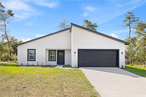 Photo of 501 Marion Oaks Golf Way, Ocala, FL 34473 (MLS # OM718313)