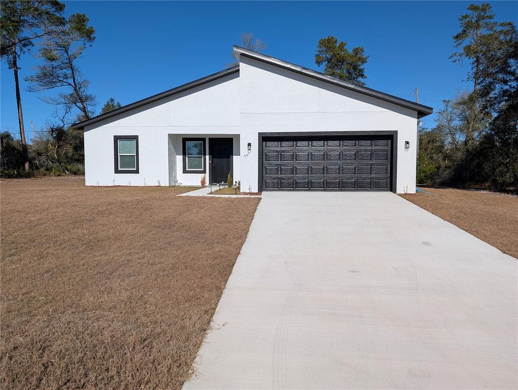 Photo of 501 Marion Oaks Golf Way, Ocala, FL 34473 (MLS # OM718313)