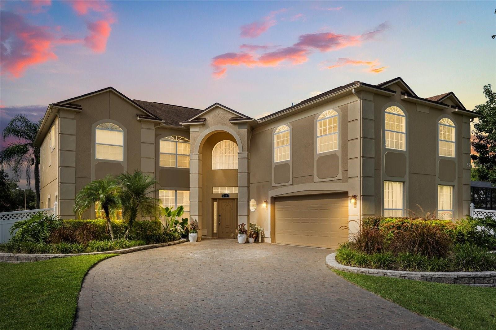 Welcome to your private oasis in the heart of Oviedo! Tucked away on a cul-de-sac in sought after Tuska Ridge, You must see this expansive 6-bedroom, 3-bath pool home on nearly half an acre; offering space, comfort, and true Florida living. The bright, open floor plan with soaring ceilings offers large kitchen featuring granite countertops, a gas range, stainless steel appliances, generous cabinet space, and multiple pantries—perfect for daily living and entertaining. A first-floor guest bedroom & full bath provide ideal space for visitors or multigenerational living, while the formal living & dining rooms offer additional places to gather. Upstairs, the spacious primary suite includes a sitting area, 2 walk-in closets, & spa-like bath with dual vanities, garden tub, and separate shower. You'll also find 3 additional bedrooms plus a huge 21x20 6th bedroom perfect as a bonus room, media room, or play space. Then step outside to your private, fully fenced backyard with lush landscaping including fruit tress (mango and cumquat), a screened-in pool, and large, covered lanai. Additional upgrades include newer interior/exterior paint, 2020 roof, 2020 A/C, irrigation system, Kinetico whole-home water filtration/de-chlorination/softening system & Kinetico reverse osmosis drinking water system, 2-car garage with epoxy flooring, and an extended Brazilian brick paver driveway. All of this and located in the top-rated Seminole County school district and just minutes from UCF, shopping, dining, and major highways—this home truly has it all!