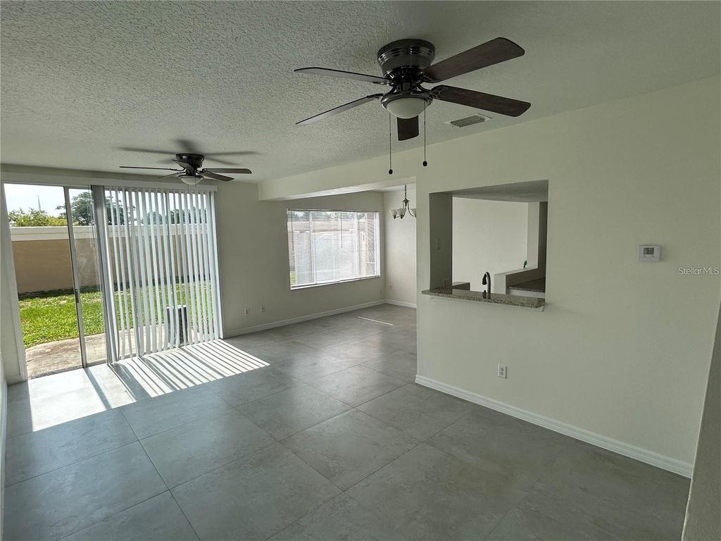 Photo of 202 Washington Palm Loop, Davenport, FL 33897 (MLS # O6426453)