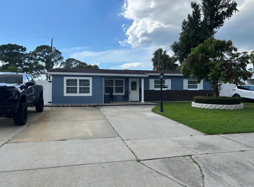 Photo of 5112 Gateway Drive, Tampa, FL 33615 (MLS # TB8521079)