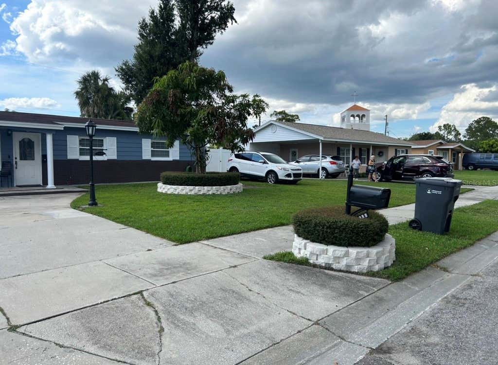 Photo of 5112 Gateway Drive, Tampa, FL 33615 (MLS # TB8521079)