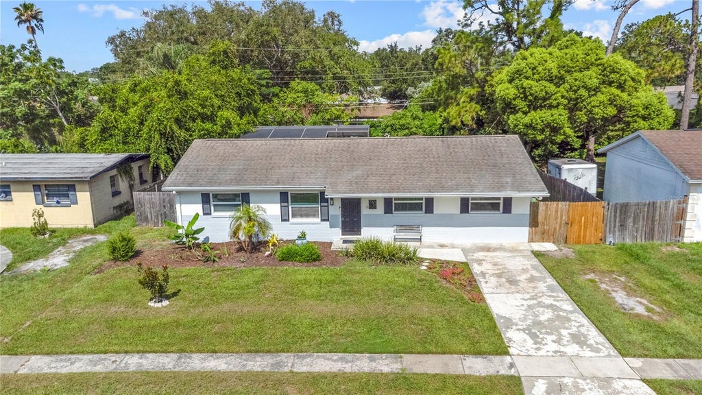 Photo of 7924 Plunkett Avenue, Orlando, FL 32810 (MLS # O6423722)