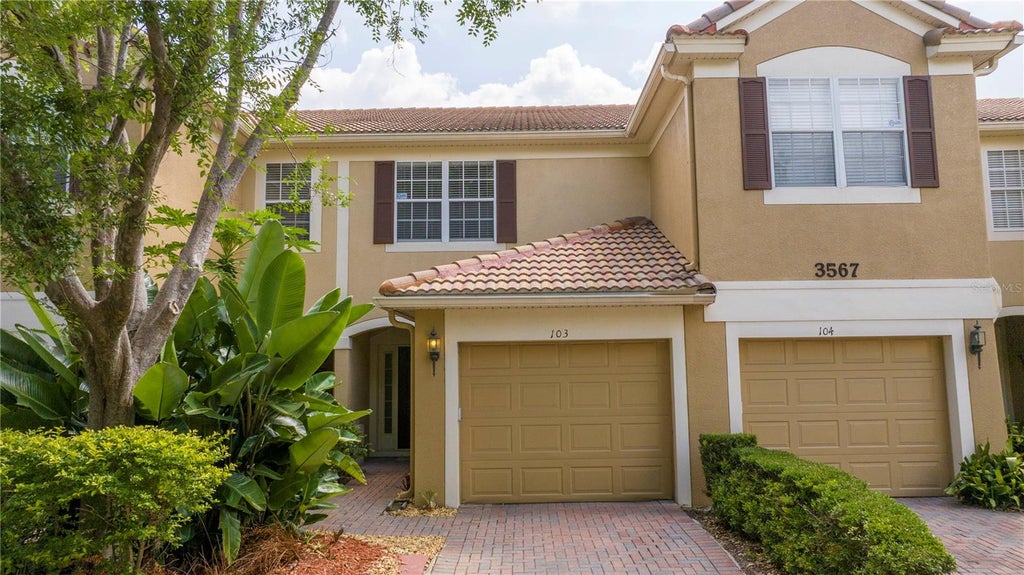 Photo of 3567 Shallot Drive #103, Orlando, FL 32835 (MLS # O6446794)