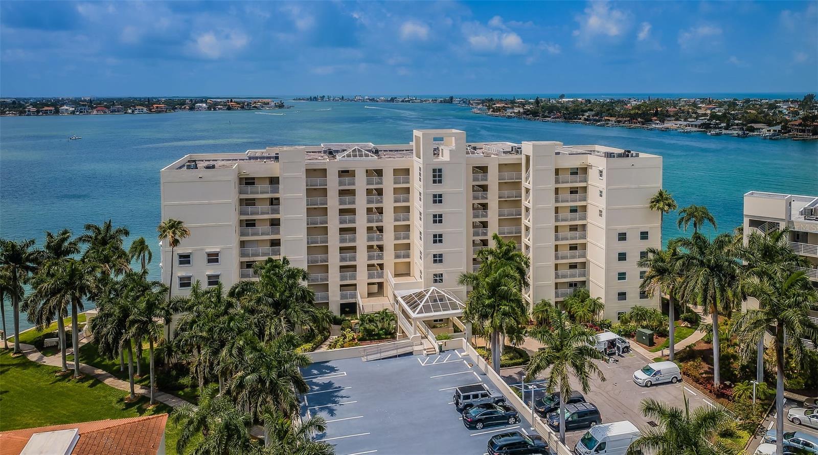 Island Living in Paradise! The water views and sunsets are the best of the best! This gorgeous, beautifully furnished condo on the "point of the point" features panoramic water views from East to West over Boca Ciega Bay to Tierra Verde and Pass-A-Grille Pass to St. Pete Beach and Don Cesar. With two private pavered wraparound balconies just steps from the water's edge and three sets of sliding French doors from the living room, dining room, and primary bedroom opening to the outside, you can enjoy nature at its best! Feel right at home in this fabulous ground floor, fully furnished 2-bedroom, 2-bath condo. Enjoy lounging in the afternoon sunshine, watching dolphins swim and pelicans dive. The kitchen, living room, dining room, and primary bedroom all have water views. The main bedroom features a king-size bed with water views and an ensuite bathroom, while the guest bedroom has a queen-size bed and access to the hall full bath. There is an additional office or reading room
behind the kitchen, giving you plenty of space and flexibility to host guests, work from home, or spread out in your new waterfront paradise. With 3 TVs and a full-size washer and dryer, you'll love everything about this outstanding condo in the prestigious Club Bahia section of Isla Del Sol. This rarely offered first-floor, walk-up home provides ground-floor convenience, and upgrades like cherry wood flooring, granite counters, plantation shutters, high-quality furnishings, and a spacious open plan. Vacation in the beautiful community of Bahia Del Mar, located on a tropical island with stunning grounds, studded with stately Royal Palms and perfectly maintained. This 1st-floor unit not only offers a beautiful panoramic view of the Intracoastal Waterway but is also just steps to the resort-style pool/spa, bike racks, and clubhouse with gym, library, and gathering room. The home is conveniently located near Isla Del Sol Yacht & Country Club with its 18-hole golf course and is close to the award-winning beaches of Fort DeSoto and St. Pete Beach. Minutes to Gulf Blvd with its array of restaurants and water activities including parasailing, jet ski rentals, kayaks, and paddleboards. Only 5 minutes to I-275 for easy access to two international airports, and 15 minutes to downtown St. Petersburg where you can enjoy upscale nightlife along the waters of Tampa Bay. Come play in paradise in the highly desirable, walker-friendly community of Bahia Del Mar. Security deposit and tenant background check required. Cleaning services provided. The unit comes with a convenient parking space just steps from the entrance, and plenty of additional parking. Leased "turnkey," which means absolutely everything in the condo is included. December 2025 Available. July-September 2025 Available.