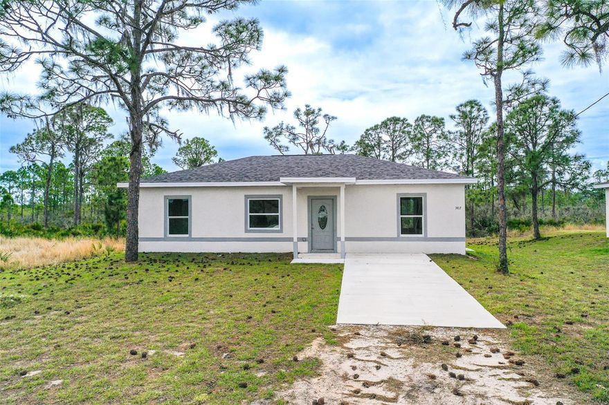 One or more photo(s) has been virtually staged. New Construction! Welcome to this custom-built 2025 home offers 3 bedrooms, 2 bathrooms, and a bright open-concept design perfect for modern Florida living. The spacious living, dining, and kitchen areas flow seamlessly together and feature durable ceramic tile flooring throughout. The kitchen comes fully equipped with brand-new stainless steel appliances and plenty of cabinet space. The primary suite offers a private ensuite bathroom and a large walk-in closet. A separate laundry room adds everyday convenience. Step outside to the open back porch overlooking an approximately ¼-acre lot—perfect for relaxing or entertaining. Located in a USDA-eligible area with no HOA. The home also includes a one-year home warranty for added buyer peace of mind. Quiet neighborhood setting while still close to shopping, dining, and the many lakes Lake Placid is known for. Great opportunity for a primary home, seasonal retreat, or investment property.
