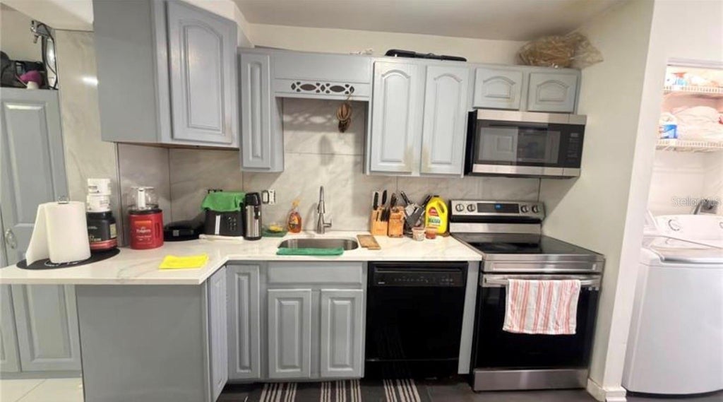 Photo of 5304 Indian Creek Drive #D03, Orlando, FL 32811 (MLS # O6438502)