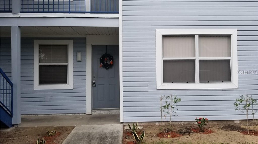 Photo of 5052 Terrace Club Lane #101, Tampa, FL 33617 (MLS # TB8555906)