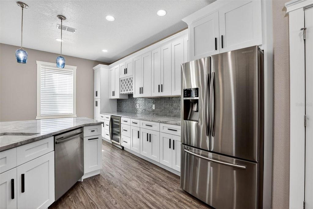 Photo of 1147 Halapa Way, Trinity, FL 34655 (MLS # TB8426989)