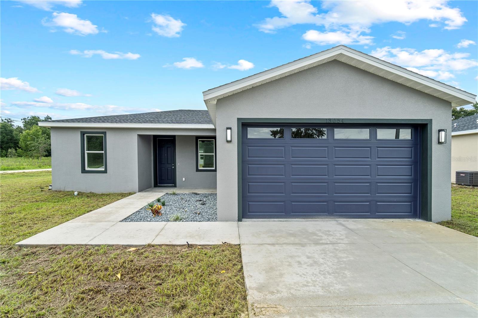 The perfect blend of comfort and style in this stunning new construction home, With no HOA, this property offers flexibility and freedom for homeowners. This home features an open floor plan, ideal for modern living and entertaining. The kitchen is beautifully designed with granite countertops and stainless steel appliances, adding a touch of luxury and durability with tile through out living areas. The primary bedroom includes a spacious walk-in-closet and a luxurious walk-in shower. You'll also enjoy the convenience of an indoor laundry room which includes the washer and dryer adding ease to your daily routine.