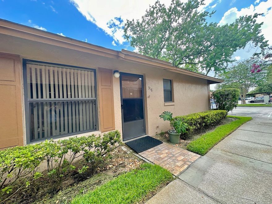 Conveniently located near Downtown Winter Garden in Town Homes of Winter Garden this quaint two bedroom, two bathroom villa offers both comfort and simplicity. With an open and inviting living and dining area the home is perfect for entertaining guests. The great room has plenty of natural light coming through the cieling skylights. The kitchen is a good size and has a laundry closet and sliding door that leads to the covered patio. The outdoor patio is ideal for grilling and enjoying the Florida weather. You will find that the primary bedroom is spacious with a walk-in closet and en-suite bathroom. The secondary bathroom has plenty of natural light and a second bathroom is located in the hallway. This home has a new washer and dryer (2024), new A/C (2024), and new water heater (2023). This home comes with two assigned parking spaces, one of which is covered. The community amenities include a community pool. Monthly dues included exterior maintenance, landscaping, and exterior insurance providing low maintenance home ownership. The unit is just minutes from supermarkets. Plant Street is close by where you can enjoy Farmer’s Market, causal and fine dining, shops, and access the West Orange Trail. Veterans Memorial is just up the road offering Tennis and Pickleball courts, baseball fields, and playground just to name a few.  SR 429 and Florida’s Turnpike can be located just a few minutes away and MCO Airport just 30 minutes away. This home is perfect for anyone looking to expand their investment portfolio, a first time homebuyer, or someone looking to downsize. Don’t sleep on this one! Schedule your private showing today!