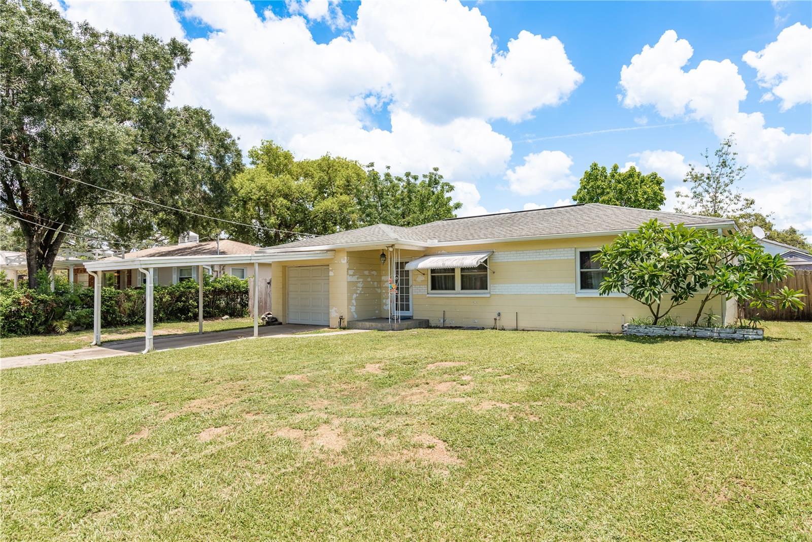 Under contract-accepting backup offers. Welcome Home to your Charming Forest Hills Retreat Near Historic Golf Course!
You will enjoy a delightful 2-bedroom, 1-bathroom, 1-car garage home nestled in one of Tampa’s most desirable and tranquil neighborhoods. Just steps from the iconic Babe Zaharias Golf Course, this inviting home offers comfort, charm, and versatility in a lush, serene setting. A Golf Cart Friendly Neighborhood. Inside, you’ll find a bright and airy layout with a spacious Florida room, perfect for relaxing in the afternoon sun or easily converted into a third bedroom, home office, or creative studio. The living spaces are warm and welcoming, filled with natural light and thoughtfully designed for everyday living. New Luxury Vinyl Floors -2022, New Roof -2018, New AC -2019, New Hot Water Heater -2023, New Gutters -2023, New Hurricane Impact Windows -2022, New Stainless Steel Refrigerator -2023.
The 1-car garage offers convenience and storage, while the large Fenced in yard provides ample room for outdoor gatherings, gardening, or simply enjoying Florida’s beautiful weather. It come with 2 Roomy Storage Sheds too.
Whether you're a first-time homebuyer, looking to downsize, or hoping to be near green space and local charm, this home checks all the boxes. With its unbeatable location near parks, dining, The historic golf course, close to airports, theme parks, and plenty of shopping, this Home offers the perfect blend of classic Florida living and modern comfort. Call for your private showing today. This Gem will not last long.