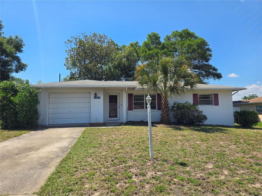 One or more photo(s) has been virtually staged. Sometimes we have to knock on opportunity’s door, and this house may be the one you have been waiting for! This two bedroom, one bathroom home offers a chance to build some serious equity with the right vision and personal touch. Centrally located in the desirable Beverly Hills Florida, right near the shopping, dining, and amenities of Lecanto while still offering easy access into Ocala for even more convenience. Enjoy living on the Nature Coast with nearby rivers, parks, biking trails, fishing, boating, and outdoor adventure all close by. Inside you’ll find luxury vinyl plank flooring throughout, a cozy layout, and a one car garage with plenty of storage space. The wonderfully landscaped front yard gives this home an inviting feel from the moment you pull up, while the screened in back patio creates the perfect spot to relax during those Florida evenings. This one is truly a diamond in the rough and with a little elbow grease, the next owner has the opportunity to create the perfect nest egg.