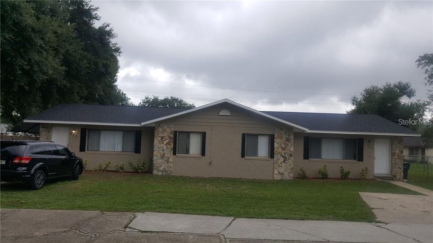 Income-producing full duplex in the desirable Lake Gibson area of Lakeland. Located in Lake Gibson Villas Phase 2, this concrete block property was built in 1981 and offers two separate 2-bedroom, 1-bath units totaling 1,842 square feet of living space.

The property has received consistent updates, helping minimize near-term capital expenses. New windows and front doors were installed in April 2024, and a third nail for wind mitigation was added in June 2023. Unit 281 features a renovated kitchen with updated counters (July 2019) and new LVP flooring in the bathroom (January 2024). Unit 283 includes a newer dishwasher (July 2019) and a replaced AC unit (August 2020). One AC system has been updated; the other remains original.

Both sides are currently occupied by long-term tenants with rental income of $1,265 and $1,285 per month. Current rents are slightly below the area average of approximately $1,250–$1,350 for comparable 2-bedroom units (buyer to verify), presenting potential upside.

Situated on a 0.25-acre lot in unincorporated Polk County, the property is conveniently located near Lake Gibson, shopping, dining, and major commuter routes. Ideal for investors seeking steady cash flow or buyers looking to house hack while offsetting their mortgage. Solid block construction, practical improvements, and a proven rental layout make this a strong addition to any portfolio.