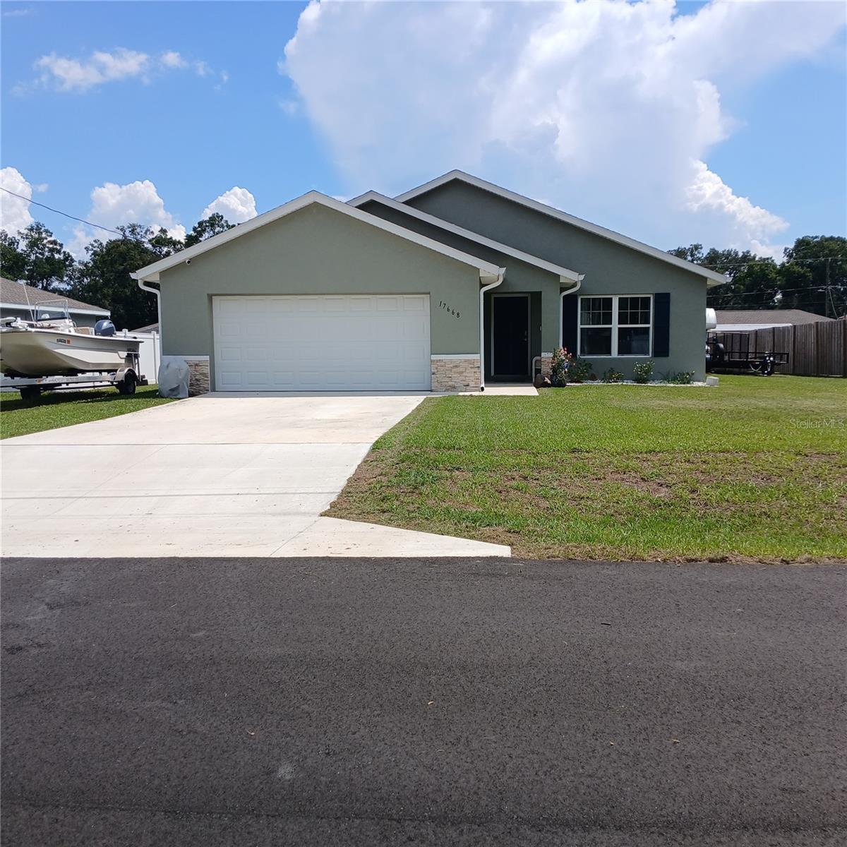 Welcome to this charming three-bedroom, two-bathroom home nestled in the heart of one of Dunnellon's most desirable neighborhoods. With 1,530 square feet of thoughtfully designed living space, this residence strikes the perfect balance between comfort and functionality.
The quality construction shines throughout, featuring durable materials and attention to detail that will stand the test of time. The open floor plan creates an inviting atmosphere, while the primary bedroom offers a peaceful retreat at the end of busy days. Two additional bedrooms provide flexibility for family, guests, or that home office you've been dreaming about.
What truly sets this property apart is its incredible location in one of Florida's most naturally beautiful areas. You'll be just moments away from the crystal-clear waters of Rainbow Springs State Park, where tubing down the pristine Rainbow River becomes your new weekend ritual. The park's natural springs maintain a refreshing 72-degree temperature year-round, making it perfect for swimming, kayaking, and wildlife viewing.
The neighborhood itself embodies the best of small-town Florida living, where friendly neighbors still wave from their yards on quiet streets. Quality schools are nearby, including Dunnellon High School, ensuring excellent educational opportunities. Daily conveniences are easily accessible, with shopping options like ALDI and Walmart just a short drive away.
This home represents more than just a place to live – it's your gateway to Florida's natural wonders and a lifestyle many only dream about. Don't let this opportunity float away like leaves on the Rainbow River.