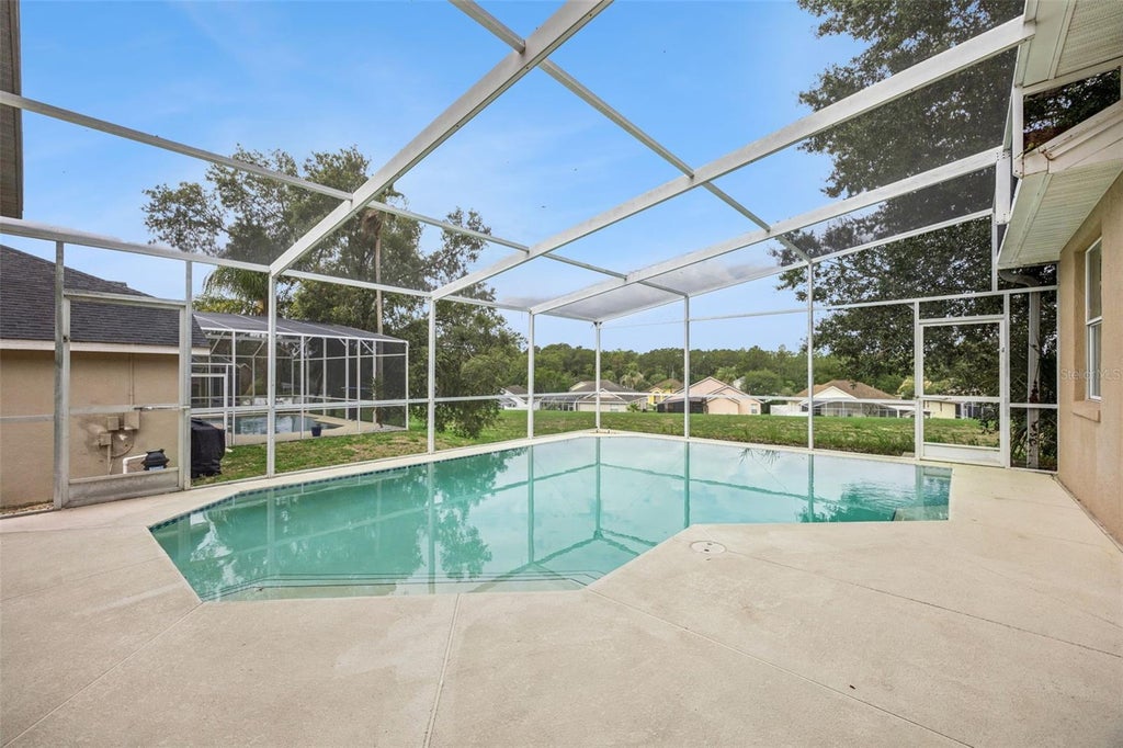 Photo of 215 Greeley Loop, Davenport, FL 33897 (MLS # O6412672)