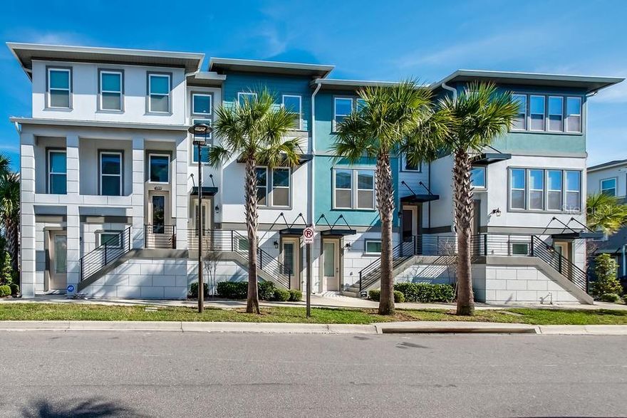 Laureate Park Luxury Townhome has 4 bedrooms with 3 private on-suite bathrooms and a guest half bath. Huge open layout with ample room for entertaining and even has a balcony for outdoor grilling. JUST COMPLETED -Updated grey wood plank Flooring in all bedrooms-NO carpet. FREE Gigabit fiber internet included. It's in the perfect location just a block from the pools, fitness center, coffee shop and Canvas Restaurant and Bar. The community of Laureate Park with scenic 40% greenspace, is in the heart of Lake Nona Medical City and Sports District. Lake Nona's 3.8 million sq/ft town center, USTA, KPMG and Orlando International Airport are just minutes away.