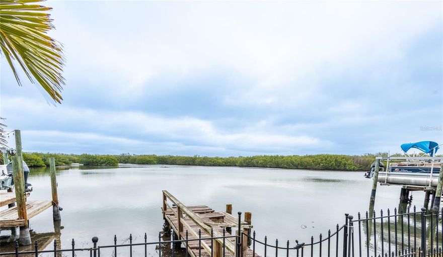 PRICE IMPROVEMENT!  Extra large waterfront lot (15,843 sf | ~ 0.36 acres) on Clam Bayou with boat access to Boca Ciega Bay.  Amazing view.  Great location.  
Situated on a quiet cul-de-sac, two blocks from Gulfport Marina and Clam Bayou Nature Park and just minutes away from charming downtown Gulfport and Interstate 275.  
The 3 bedroom, 2 bath, 2-car garage home was impacted by Hurricane Helene, has been professionally remediated and is prime for making it your own to renovate, enlarge or rebuild.