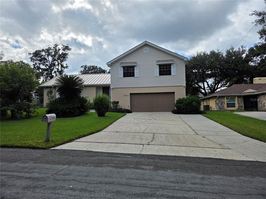 NO HOA, NO CDD community. Welcome to your South Lakeland oasis! This 4-bedroom, 3-bath - 2820 sq.ft home   is located in the highly desirable 33813 ZIP code and offers the perfect blend of comfort, style, and functionality ! Situated on a spacious, fully fenced lot, this property features a large backyard, perfect for entertaining or relaxing in privacy. Enjoy sunny Florida days in covered lanai and fire up the grill at the outdoor large size of back yard having mango and other matured trees.  Inside, you'll find a beautifully updated kitchen with granite countertop.  The kitchen also highlights extra granite countertop space on the other side of kitchen -all ready for move-in ease. . A bonus room makes a perfect home office or flex space. Two car garage has extra storage space.   New METAL ROOF has been installed on May 2025.  Convenient location close to schools, shopping, YMCA,  dining, and major highways.  Don’t miss your chance to own this move-in-ready home in one of Lakeland’s most sought-after areas—schedule your private tour today!