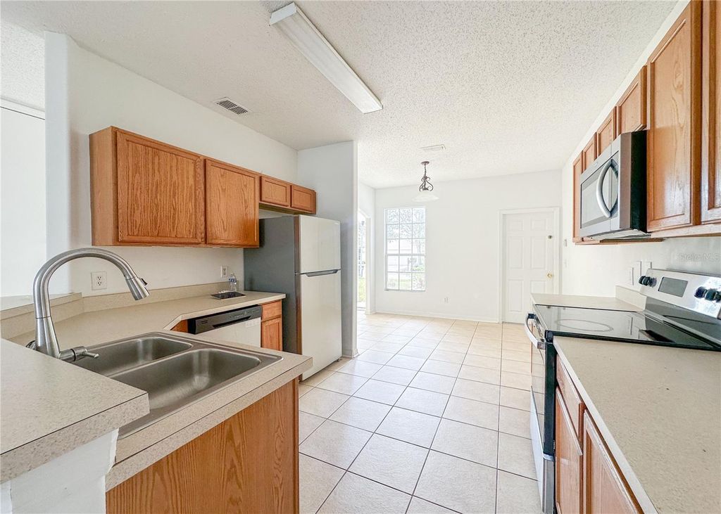 Photo of 402 Sunset View Drive, Davenport, FL 33837 (MLS # O6379036)