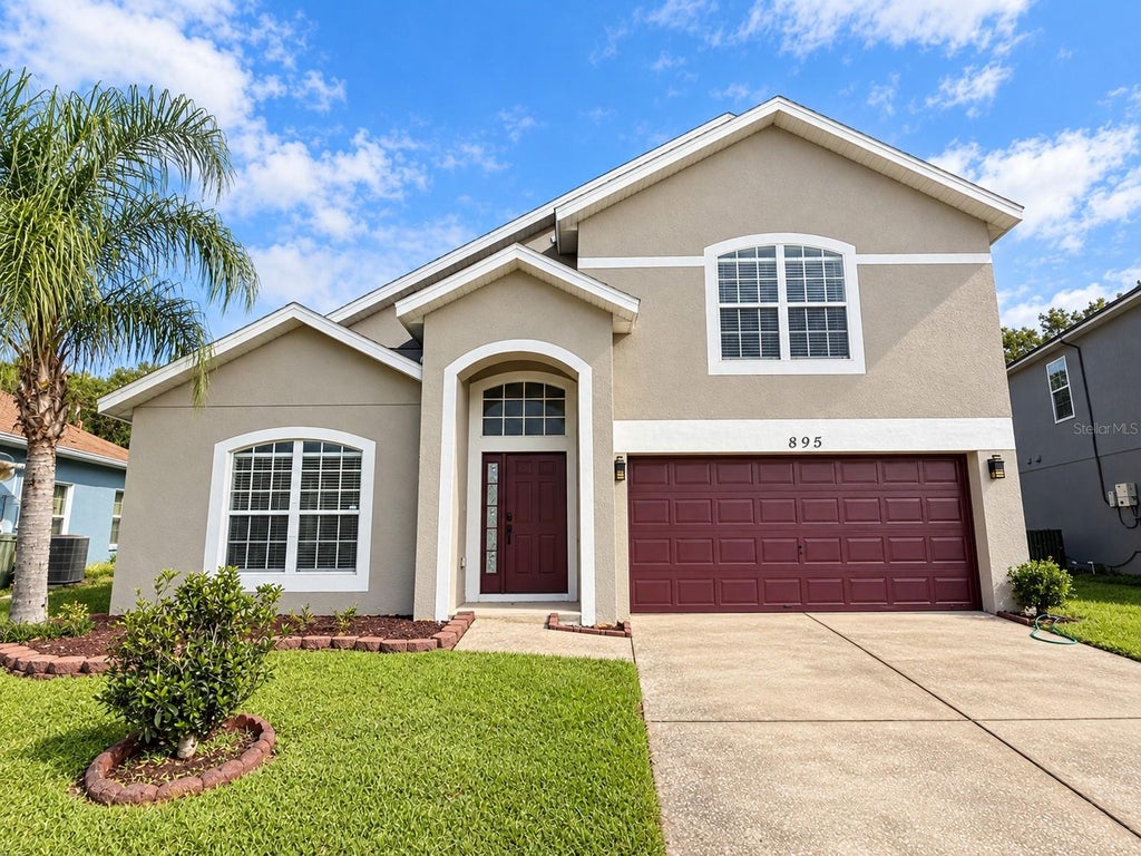 Photo of 895 Hacienda Circle, Kissimmee, FL 34741 (MLS # S5158077)
