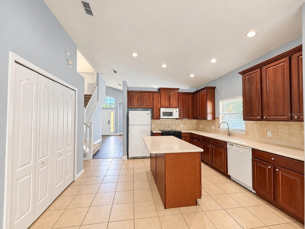 Photo of 895 Hacienda Circle, Kissimmee, FL 34741 (MLS # S5158077)