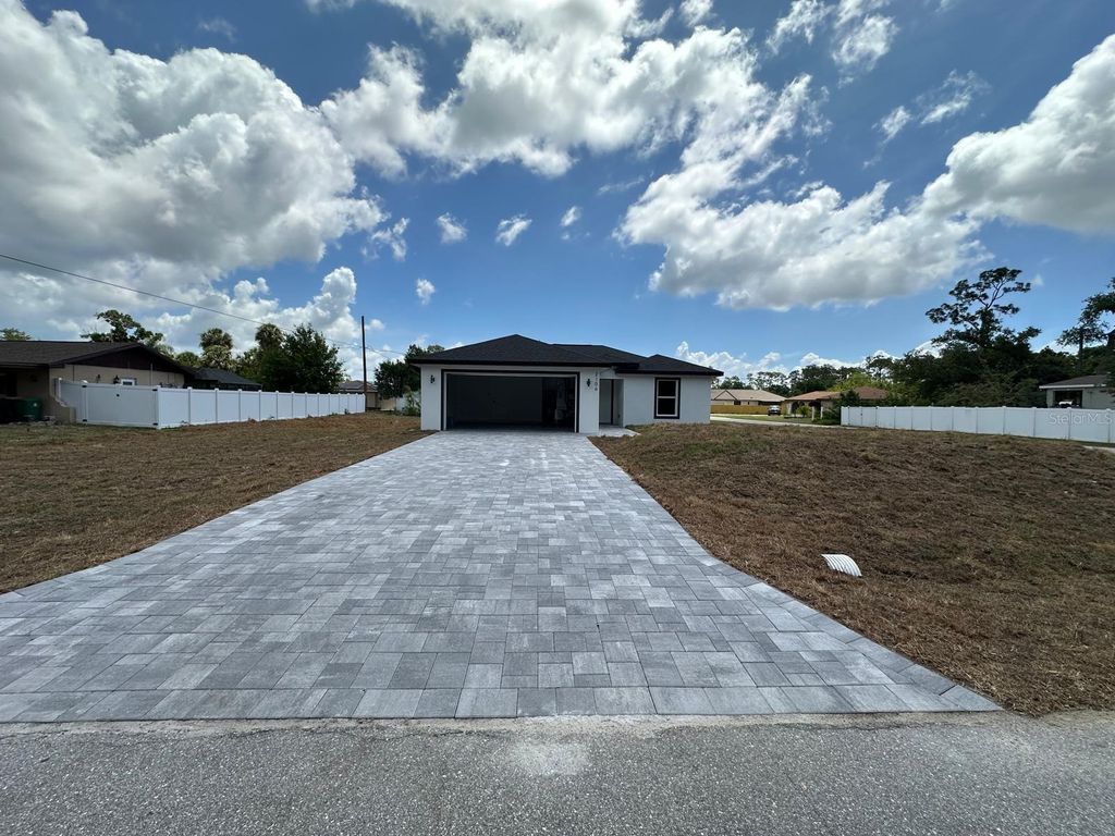 Photo of 2106 Basin St Avenue, Port Charlotte, FL 33952 (MLS # C7525950)